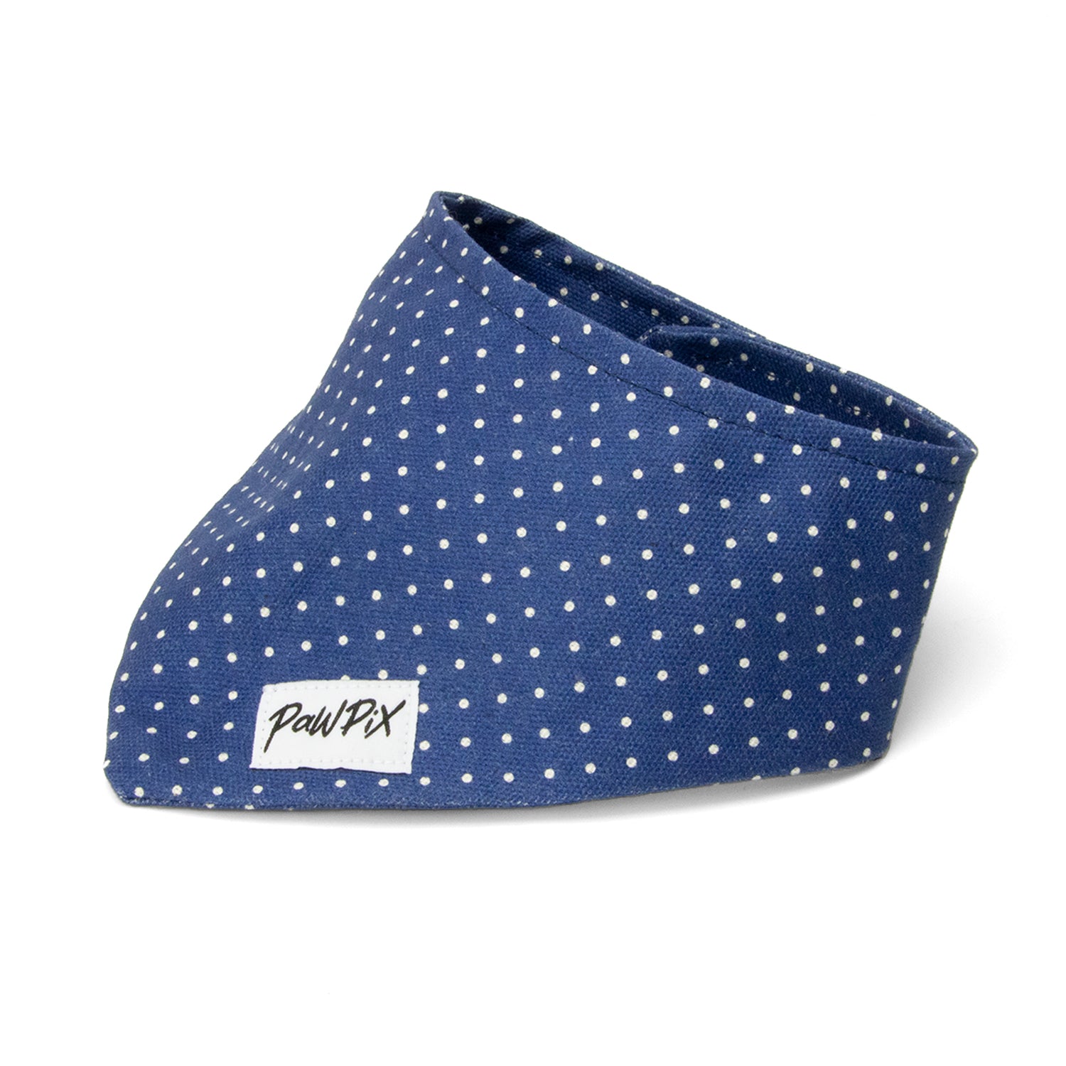 Bandana pour chien Polaris. Disponible en plusieurs tailles : du mini au maxi chien. Design bleu marine avec des pois blancs