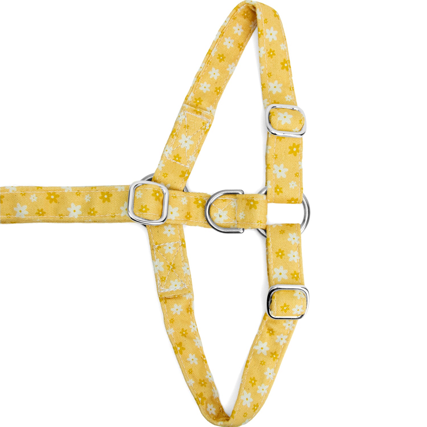 Vue à plat du dessous de harnais pour chien Peachy Daisies et la mise en avant de la boucle anti-traction argenté