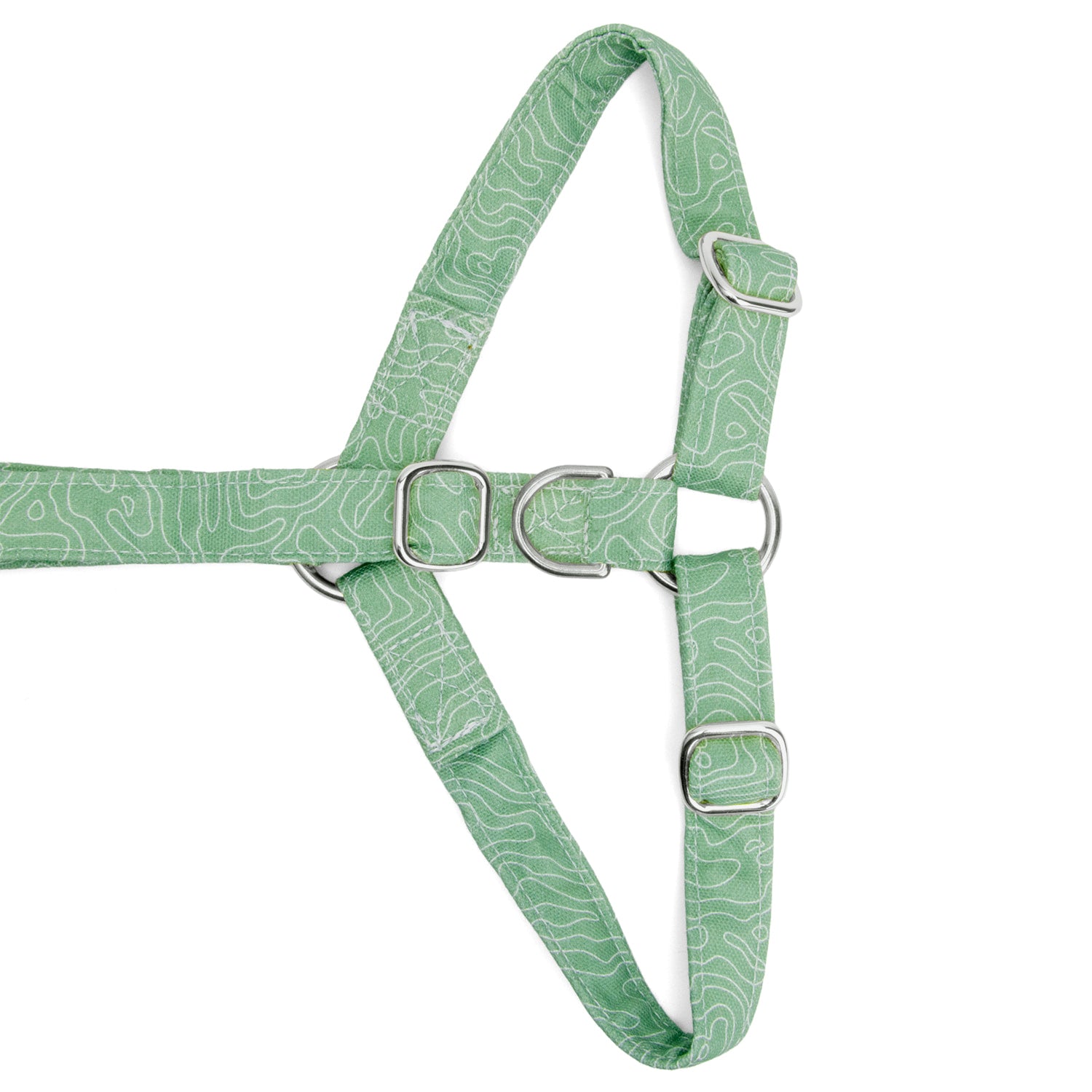 Vue à plat du dessous de harnais pour chien Topo  et la mise en avant de la boucle anti-traction argenté