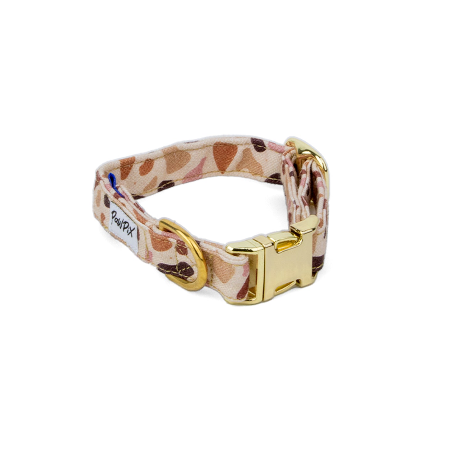 Collier pour chien Pawpino. Design marbré terrazzo couleur rose et variété de marron. Avec une boucle couleur or claire. 