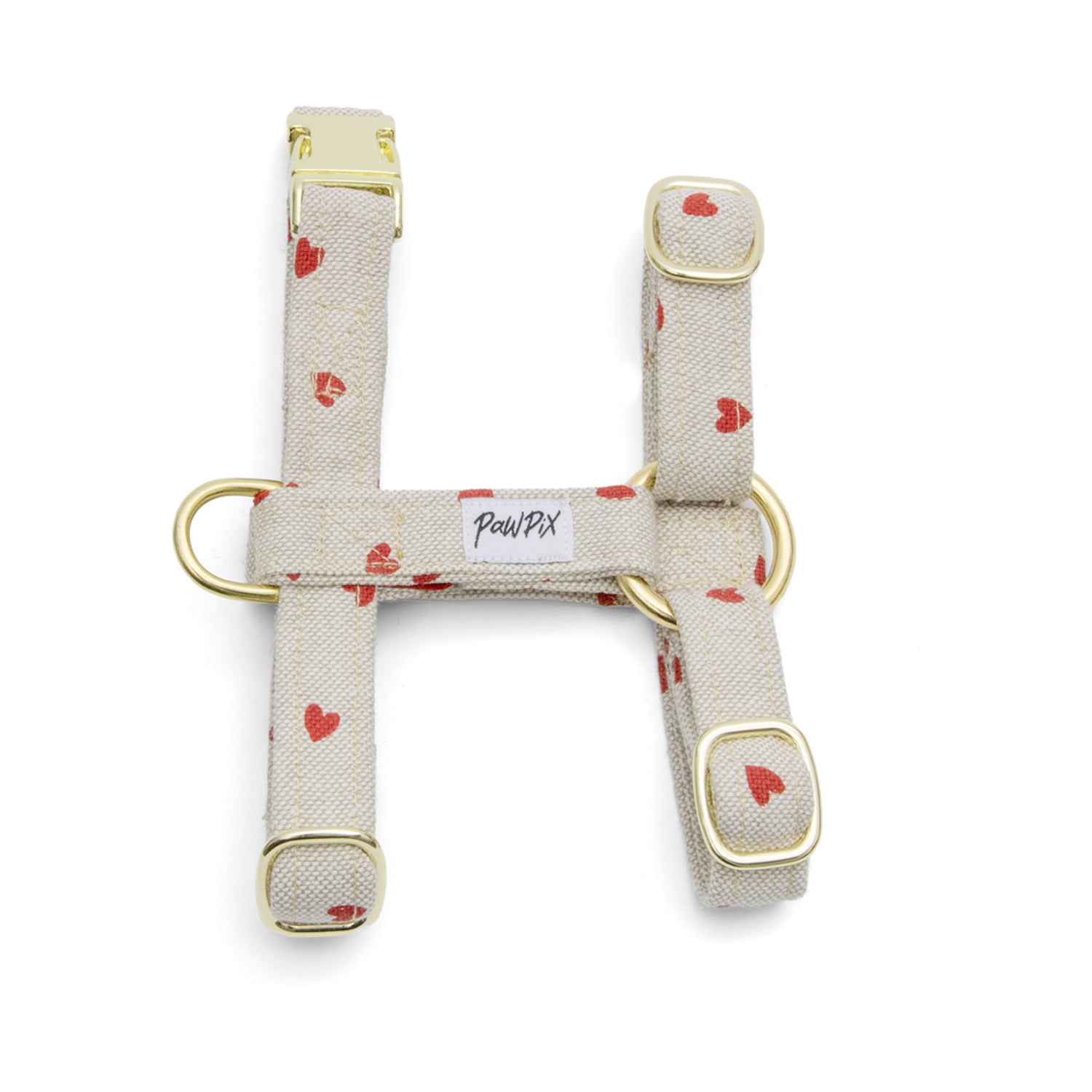 Harnais en H pour chat design My Valentine. Motif coeurs rouges sur fond beige avec une boucle clips en métal et un anneau en D pour accrocher une laisse