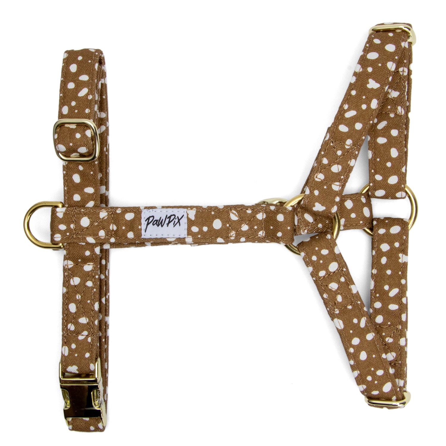Harnais en Y Freckles et son motif marron tacheté blanc. Le harnais possèdes des boucles couleur or pour regler le harnais au mieux sur le chien