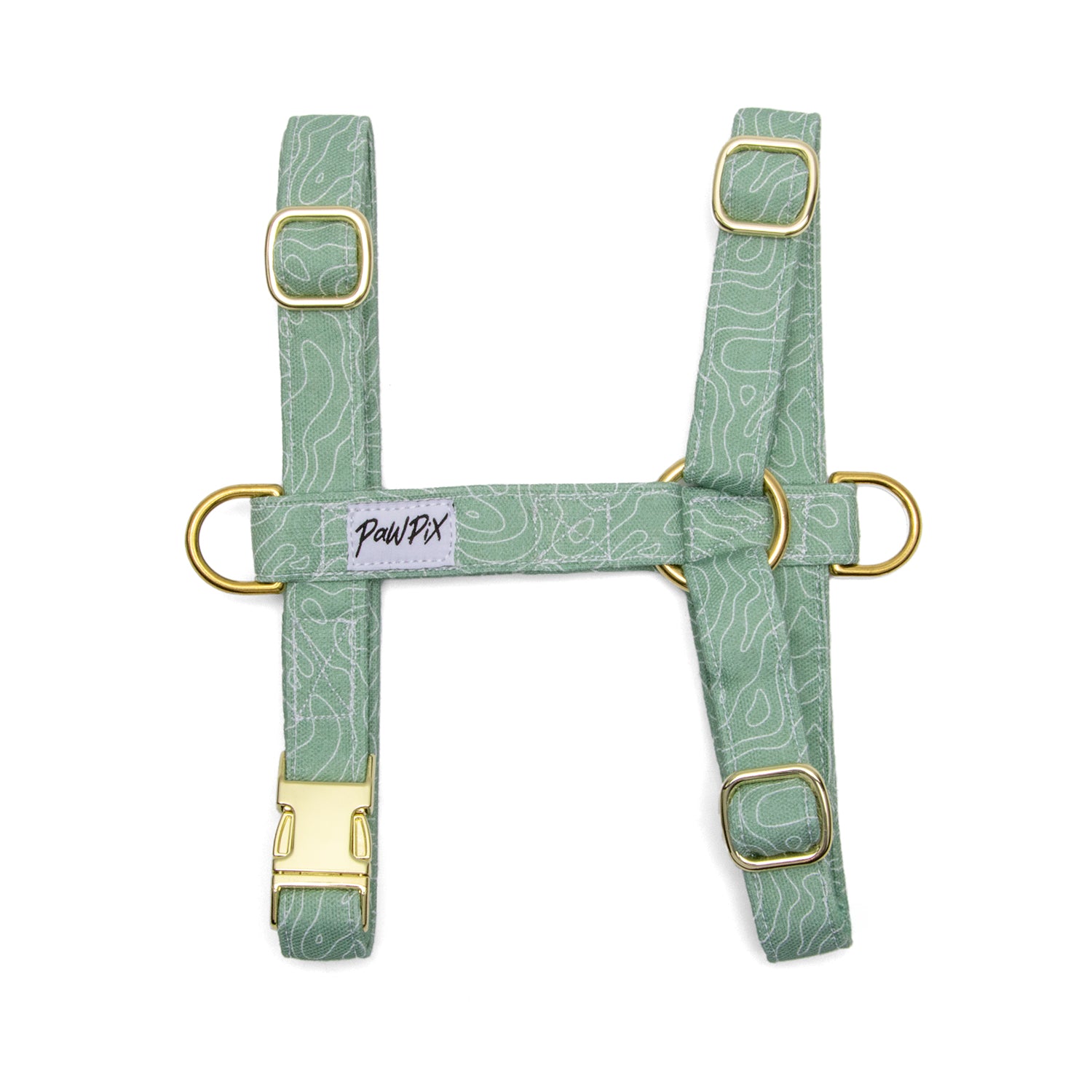Harnais en H pour chien Topo : Motif topographique blanc sur fond vert. Le harnais comporte une boucle anti-traction pour les chiens les plus fougueux. 
 Le motif Topo reprend le design géométrique des cartes de montagnes, avec des lignes blanches sur un fond vert