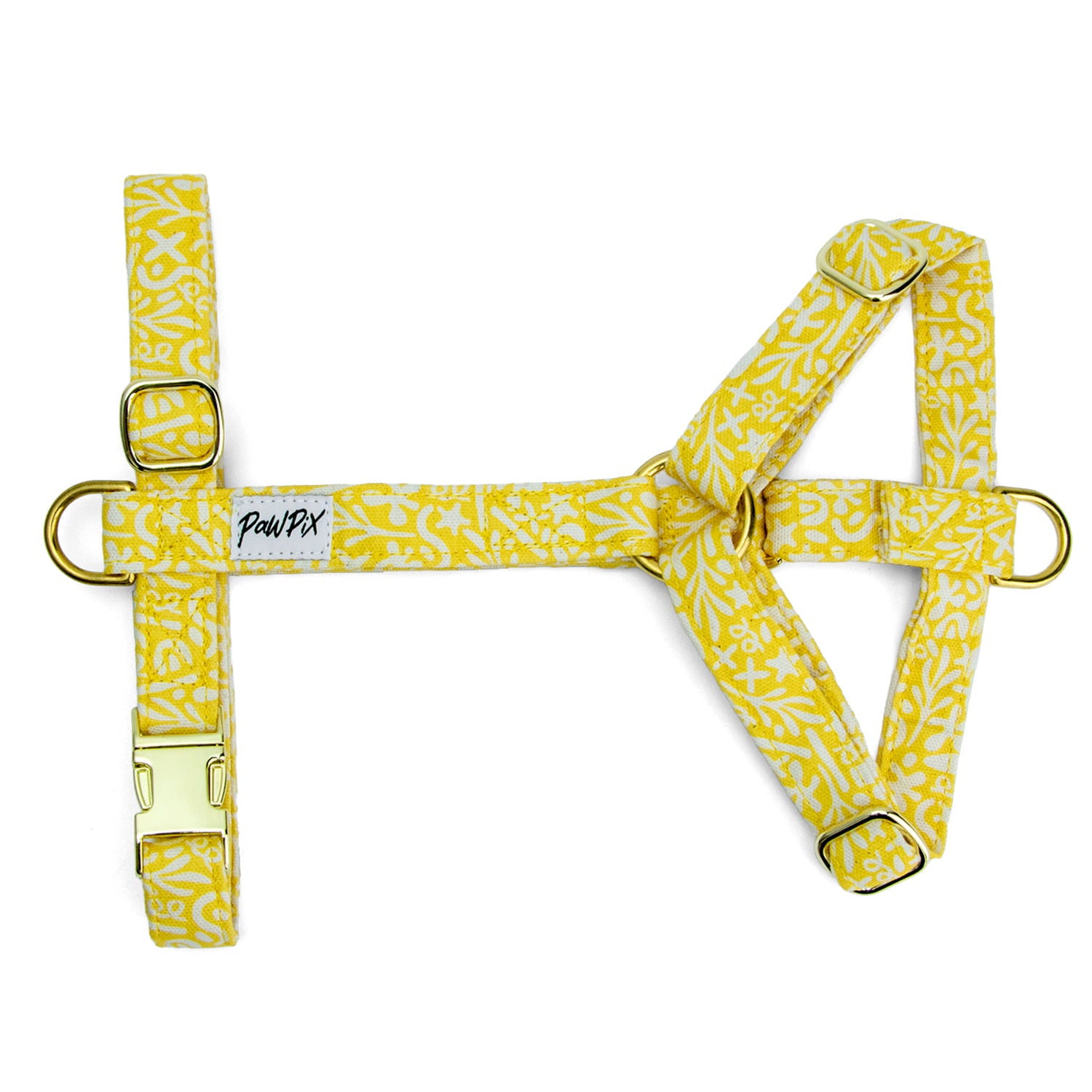 Harnais pour chien Seaside et son motif marin abstrait blanc sur fond jaune. Le harnais est en H avec une boucle anti traction. Il possède également 4 boucles de réglages, un anneau en D et une boucle clips couleur or.  