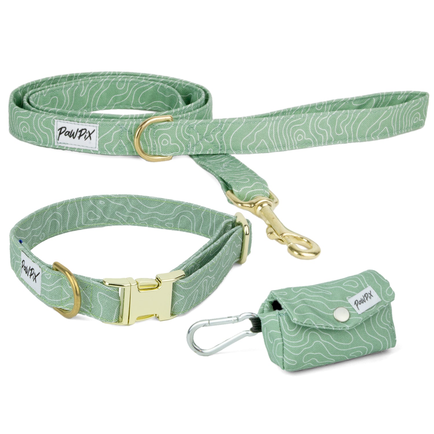 Kit de balade Topo pour chien moyen. Composé d'une laisse, un collier taille moyen et d'une pochette sac à crottes. Le motif Topo reprend le design géométrique abstrait des cartes de montagnes, avec des lignes blanches sur un fond vert