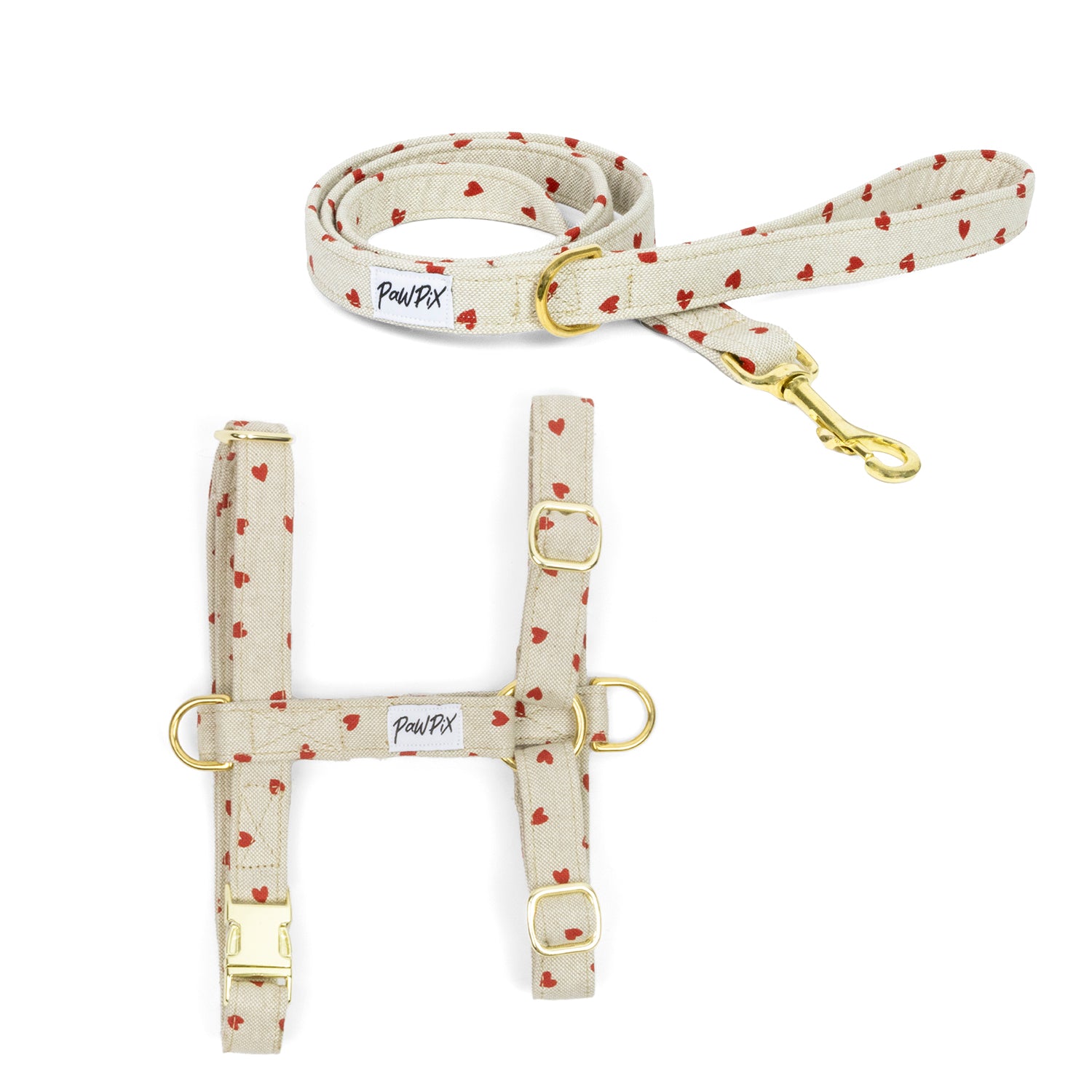 Kit de balade pour chien en version Harnais. Le kit comprends une laisse et un harnais pour chien disponible en différentes tailles. Le design est celui de My Valentine à savoir des coeurs rouges sur un fond beige clair. 
