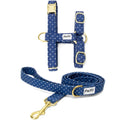 Kit harnais pour chat Polaris. Le kit comprend une laisse d'1m20 de longueur et un harnais en H disponible en 2 tailles différentes pour chat et grand chat. 
Le design Polaris est un motif de pois blanc sur fond bleu marine