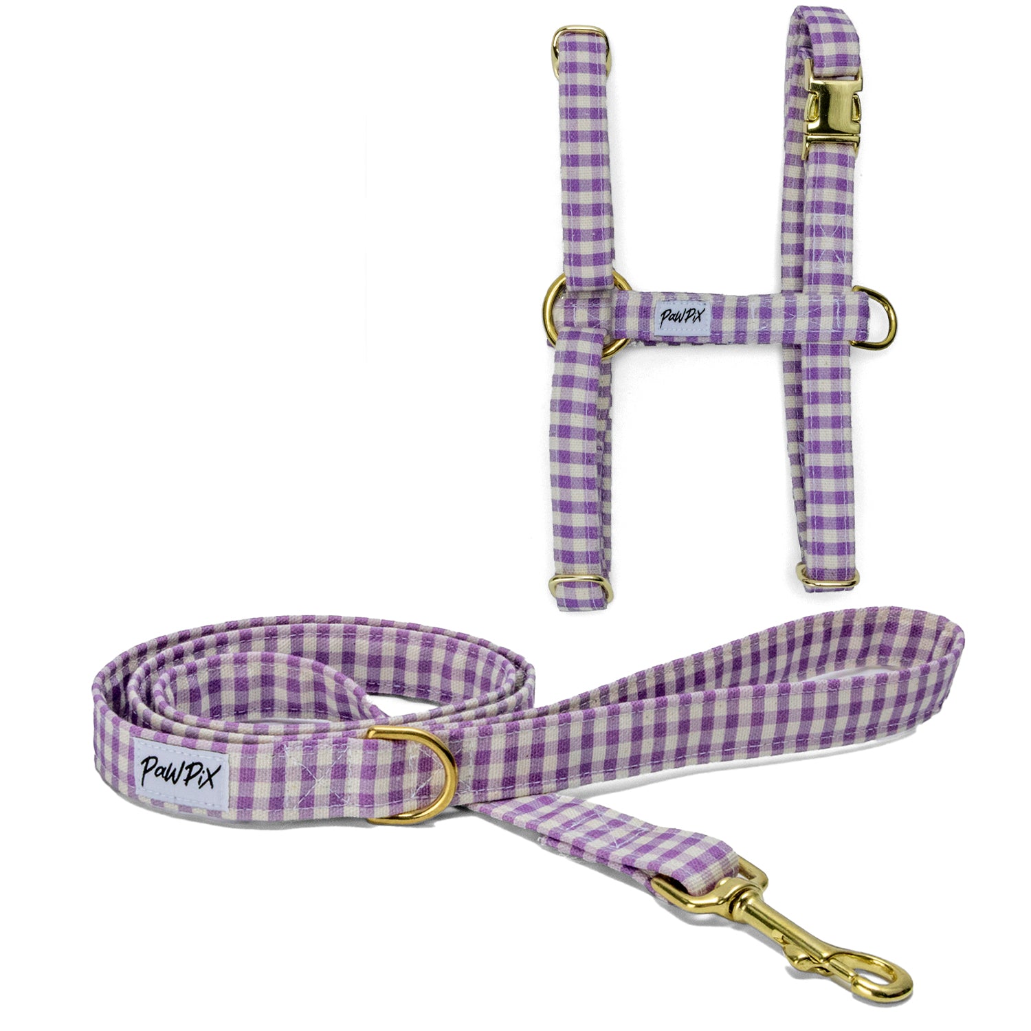Kit harnais pour chat Cigalou. Le kit comprend une laisse d'1m20 de longueur et un harnais en H disponible en 2 tailles différentes pour chat et grand chat. 
Le design Cigalou est un motif vichy couleur lavande ou violet clair
