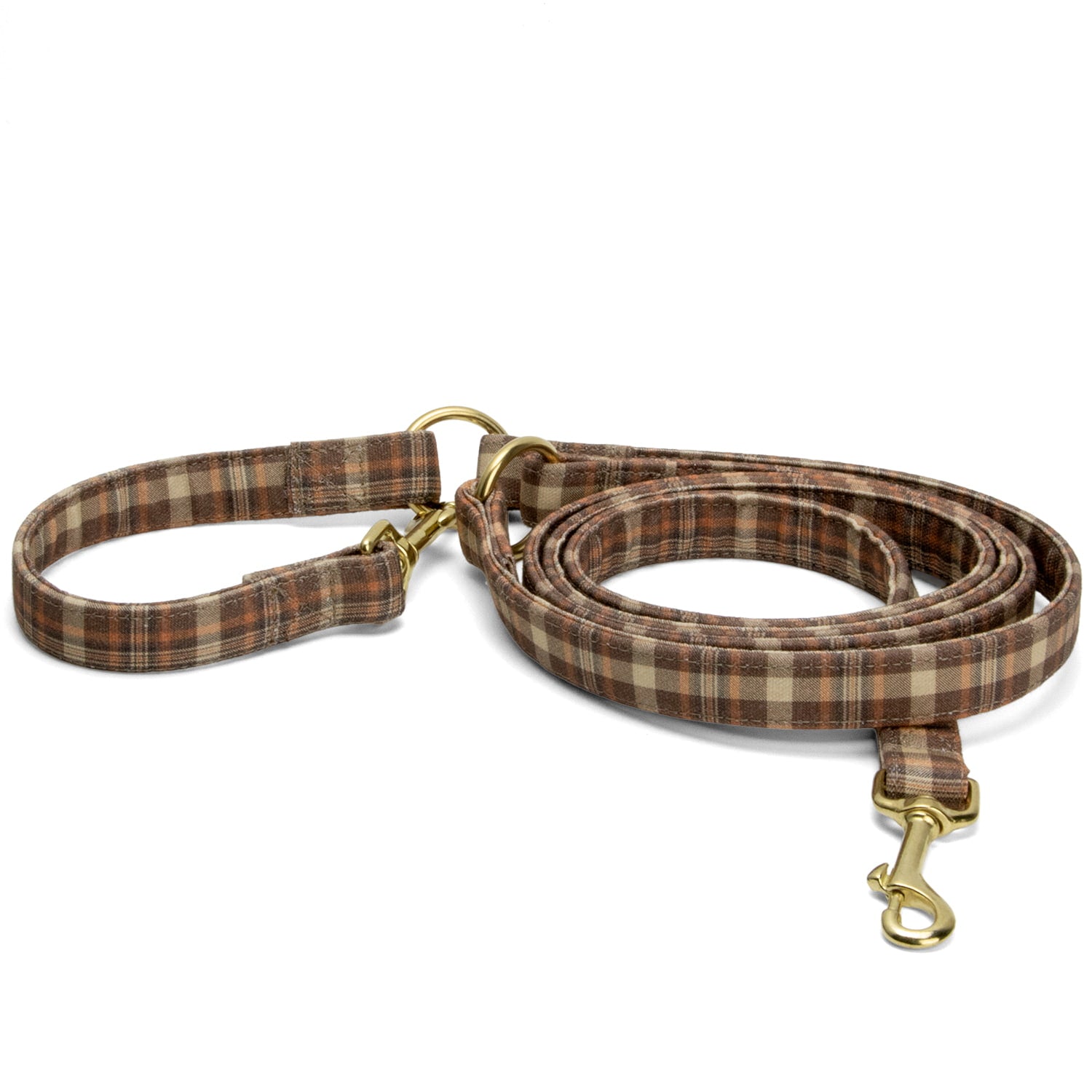 Laisse pour chien multipositions Scotty et son motif tartan marron, orange automnal. La laisse possède des boucles de couleur or
