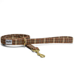 Laisse pour chien Scotty et son motif tartan marron/orange et ses boucles couleur or. 