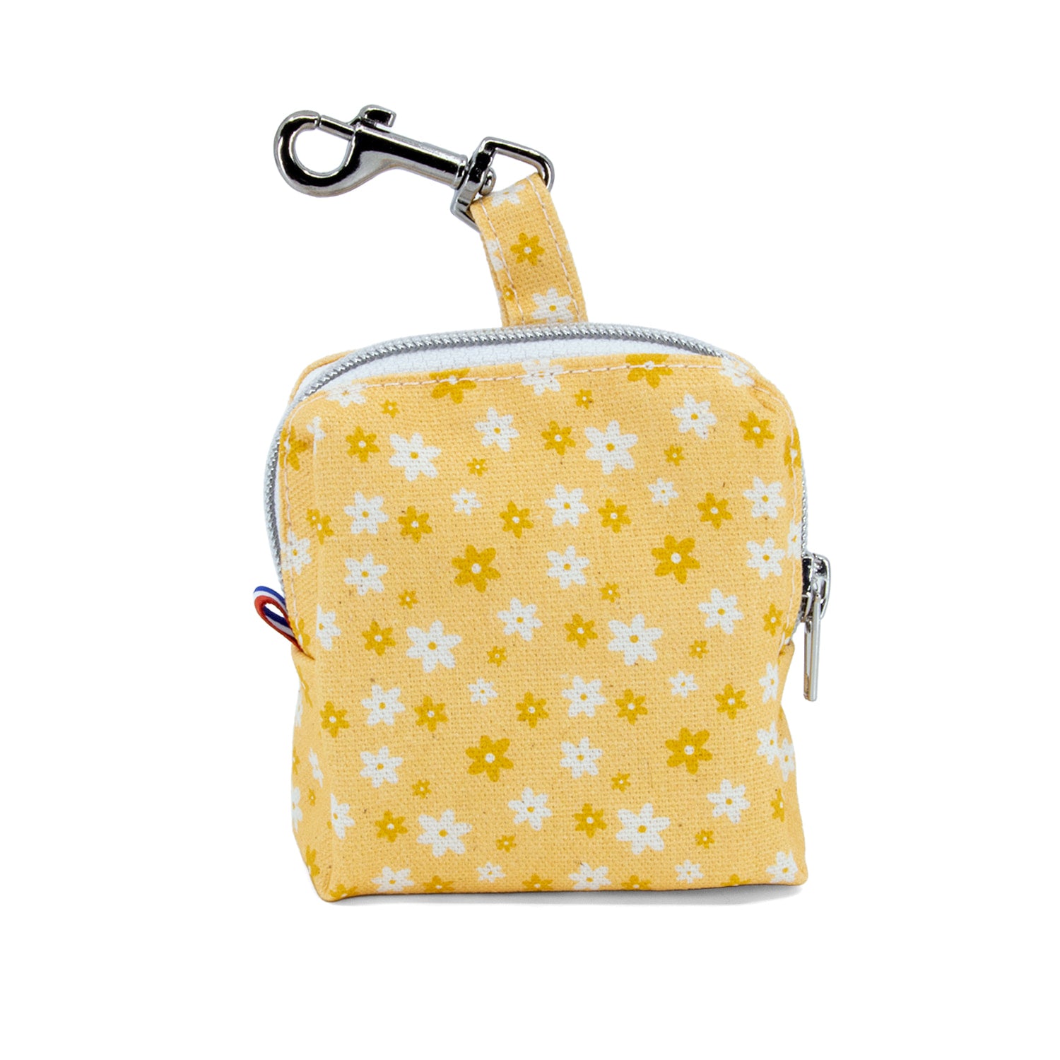 Vue d'ensemble de la mini sacoche Peachy Daisies et son motif marguerites blanche/jaunes. Equipé d'un zip pour la fermeture et d'un mousqueton pour l'accroche 