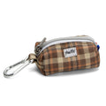 Pochette en tissu pour chien Scotty servant à ranger les sacs à crottes. La pochette est en tartan orange/marron avec un mousqueton et un zip d'ouverture/fermeture