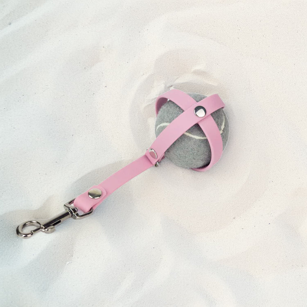 Porte balle PawPix couleur lavande posé dans le sable 