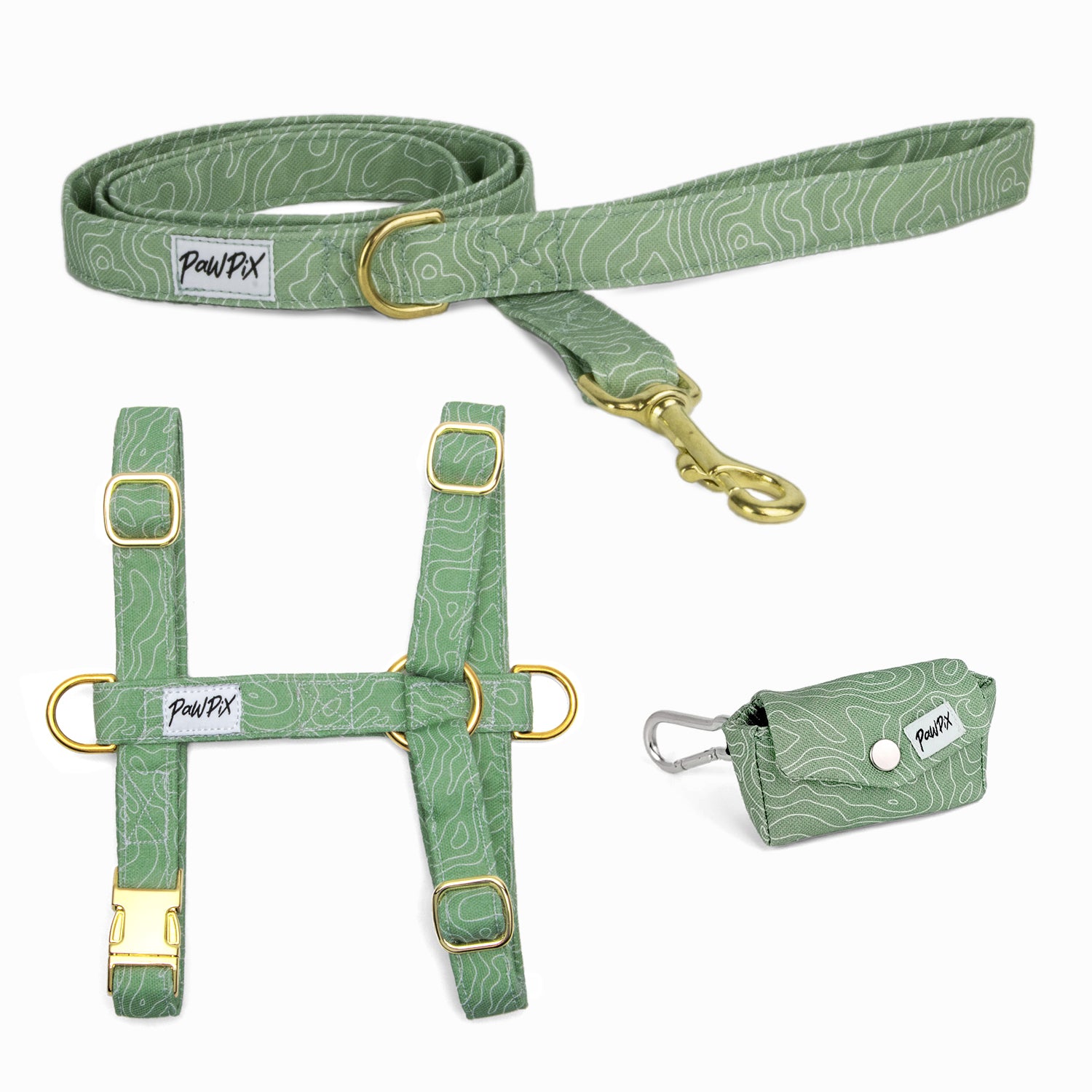 Kit pour chien comprenant un harnais en H, une laisse d'1m20 et une pochette sacs à crottes. Le tout au motif Topo, un design reprenant l'esprit montagne blanc sur un fond vert. 